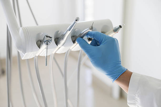 Professional Tooth Extraction technician working in McChord AFB, WA